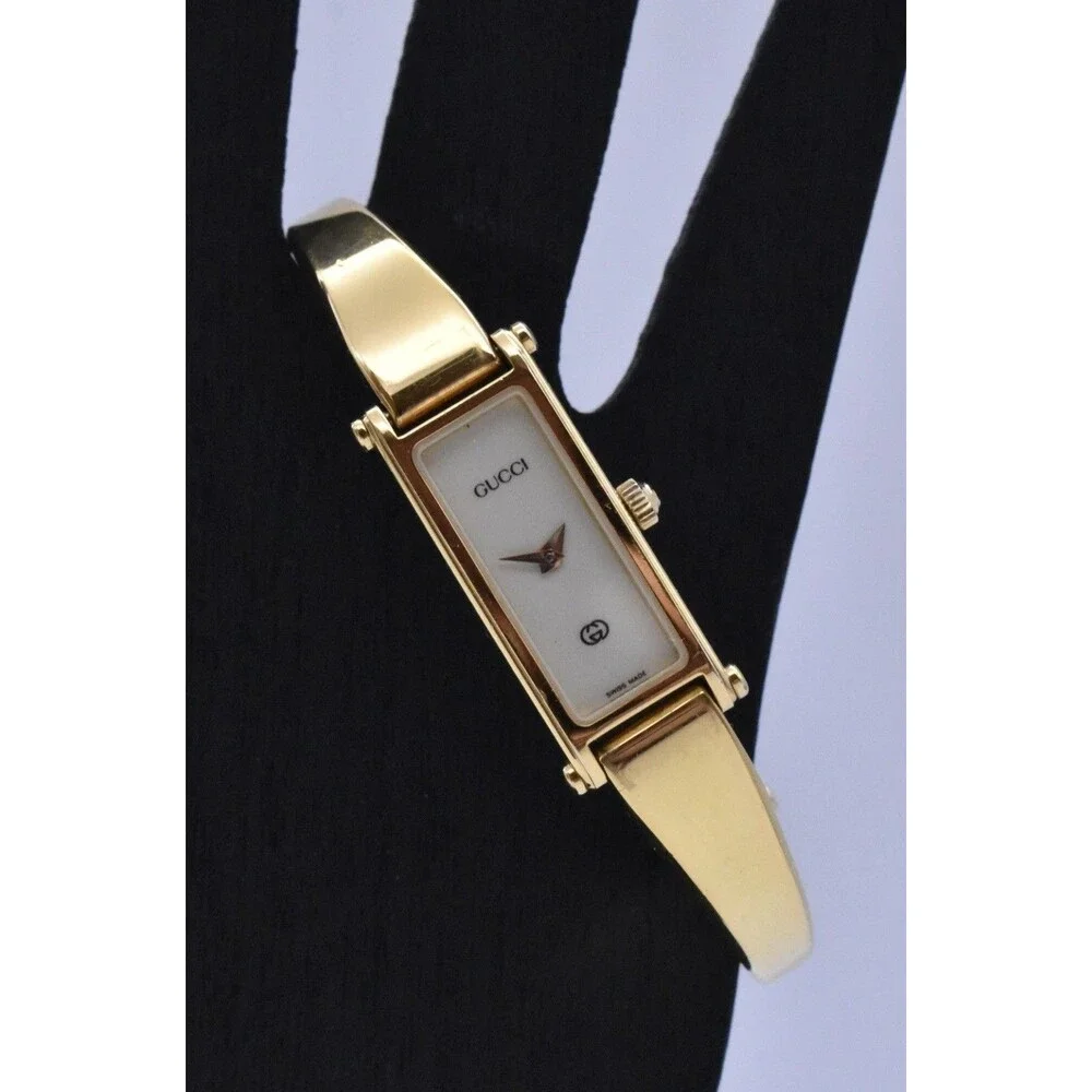 Vintage Gucci 1500L Ladies Gold Tone Bangle Watch Cream Dial Swiss Quartz
